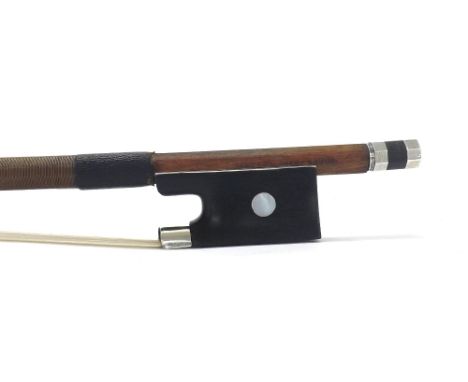 Silver mounted violin bow stamped Roger Francois Lotte, the stick round, the ebony frog inlaid with pearl eyes and the ebony 