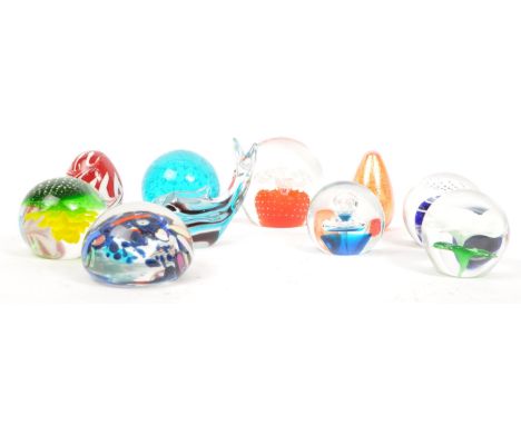An assortment of vintage 20th century art glass paperweights to include canework, lamp work, azurine and bubble control. Also