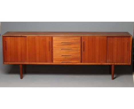 NILS JONSSON FOR HUGO TROEDS, a Scandinavian teak sideboard, 1960's/70's, of low oblong form, four central drawers with lug h