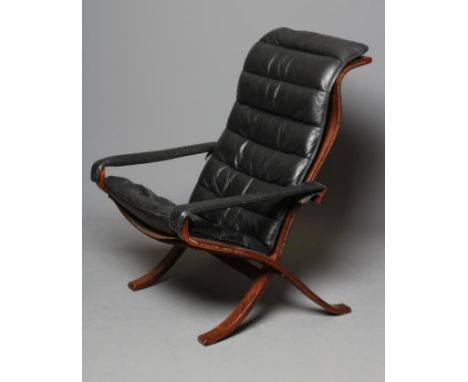 INGMAR RELLING FOR WESTNOFA, Norway, a stained beech folding armchair with slung canvas seat and black leather cushions, 29" 