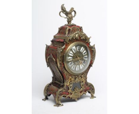 A FRENCH RED BOULLE AND GILT METAL TABLE CLOCK, late 19th century, the twin barrel movement with anchor escapement striking o