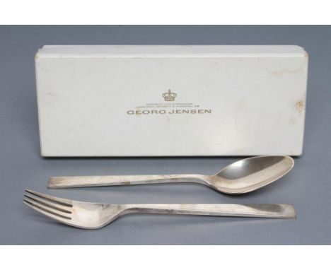 A GEORG JENSEN SILVER DESSERT SPOON AND FORK, stamped Sterling, with tapering angular stems, 7" long, 3ozs total, boxed (Est.