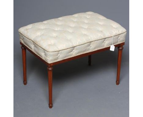 AN EDWARDIAN MAHOGANY DRESSING STOOL of oblong form with ebony stringing, the seat button upholstered in pale blue and cream 