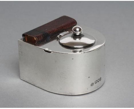 AN EDWARDIAN SILVER INKWELL, maker's mark rubbed, London 1905, of D form, the hinged cover enclosing original glass well, wit