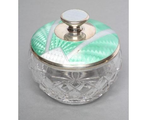 AN ART DECO CIRCULAR GLASS DRESSING TABLE JAR with silver cover, maker's mark W? Ltd., Birmingham 1930, the lift-off domed co