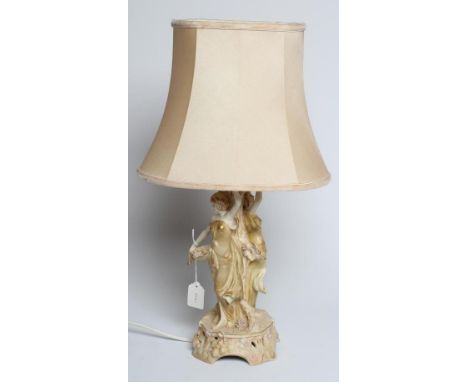 AN ART NOUVEAU ROYAL VIENNA PORCELAIN TABLE LAMP BASE modelled as two young girls, one holding out her skirt containing fruit