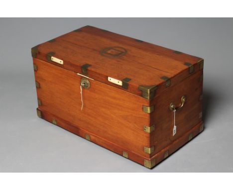 A SMALL MAHOGANY BRASS BOUND TRUNK, c.1900(?), the hinged lid with central brass ring enclosing a plaque bearing the initials