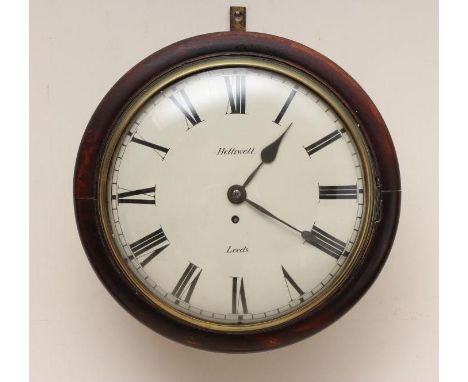 A MAHOGANY WALL TIMEPIECE, with single fusee movement, the 12" white enamel dial with Roman numerals signed Helliwell Leeds, 