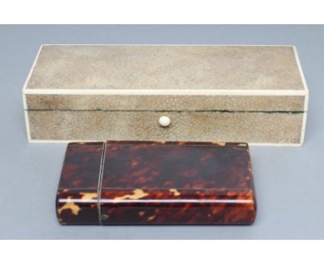 A TORTOISESHELL CIGAR CASE, early 19th century, of plain oblong form with white metal stringing, 5 1/4" x 3", together with a