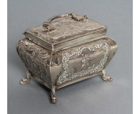 A DUTCH CADDY (833 standard), 1887, of bombe oblong form, all-over chased with panels of figures, the hinged cover with flat 