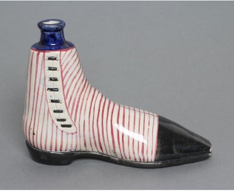 A SCOTTISH PEARLWARE NOVELTY SPIRIT FLASK, probably Portobello, c.1840, modelled as a lady's boot with black toes, heel and l