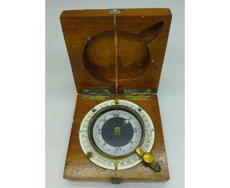 A boxwood travel compass with broad arrow mark to lid