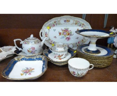 An Aynsley dessert set, a three piece tea service and tray by Oscar de la Renta and two other cups