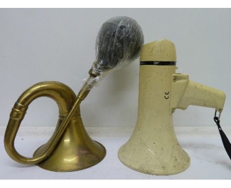A megaphone and a brass car horn