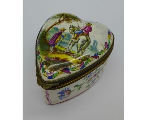 A heart shaped enamel box