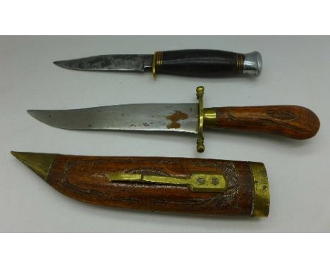 A knife and a dagger with wooden scabbard