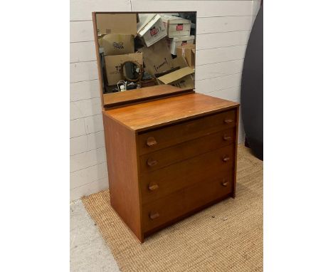 A Mid Century dressing table comprising of four drawers and mirror over AF (H130cm W77cm D46cm)