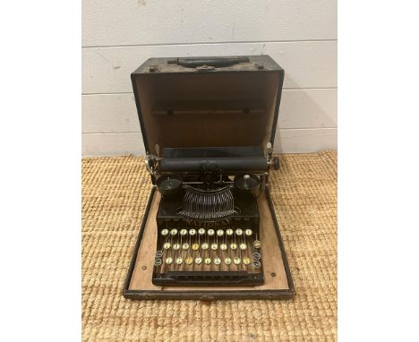 A vintage and boxed National type writer No5