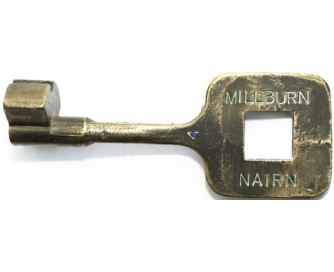 Tyers No12A single line bronze key token MILLBURN - NAIRN. Configuration B, in original condition measures 5.75in long.