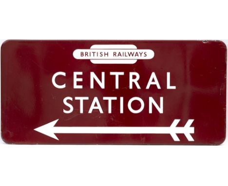 BR(M) FF enamel station direction sign CENTRAL STATION with left facing arrow and British Railways totem. From probably Manch
