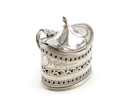 A George III Irish silver mustard pot, maker's mark partially worn, Dublin 1789, oval form, pierced and engraved scroll decor