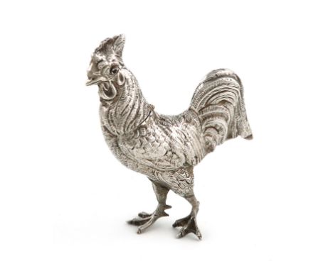 A Dutch novelty silver cockerel box,modelled in a standing position, hinged head set with red eyes, textured feathers, height