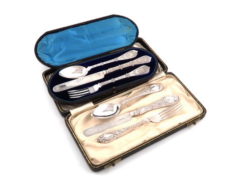 Two three-piece Victorian silver christening knife, fork and spoon sets, one by Martin & Hall, the knife Sheffield 1878, the 