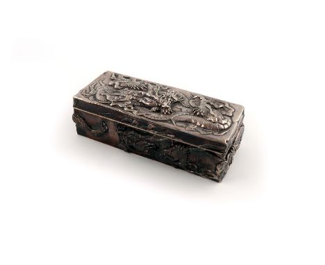 An Oriental silver-mounted wooden box, unmarked, possibly Japanese, rectangular form, embossed with stylised dragons, on a ha