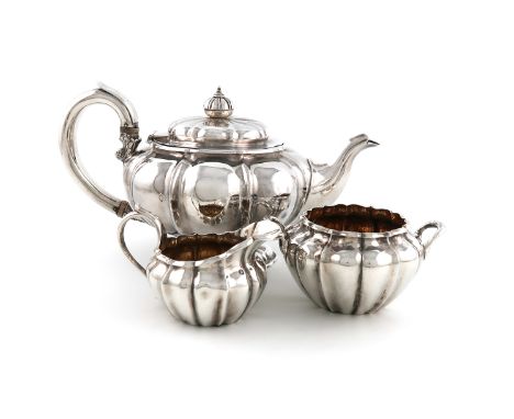 λA William IV silver teapot, together with a cream jug and sugar bowl, the teapot by John Terrey, London 1830, the cream and 