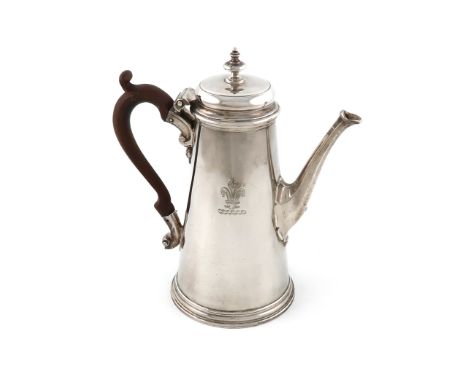 A George II silver coffee pot,by John Swift, London 1732,tapering circular form, scroll handle, the hinged cover with a balus