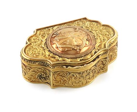 A George IV silver-gilt presentation snuff box, by John Reily, London 1824, cartouche form, chased foliate scroll decoration 