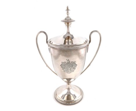 An Edwardian silver two-handled cup and cover, by Charles Stuart Harris, London 1903, plain urn form, shell-capped scroll han