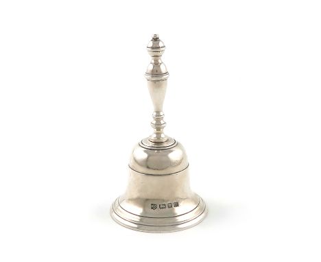 A silver table bell,by R. Comyns, London 1927,plain form, baluster handle, height 10.5cm, approx. weight 5.8oz.