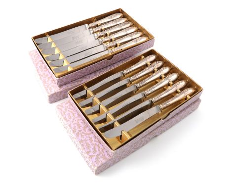 A set of twelve modern silver-handled table and dessert knives,by Garrard and Co., Sheffield 1966,with Ribbon and Reed and fo