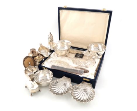 A mixed lot of silver items,various dates and makers,comprising: a cased four-piece dressing table set, a pair of pierced she