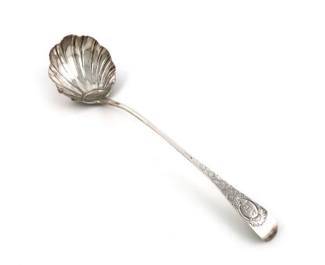 A George III Irish provincial silver soup ladle, by William Reynolds, Cork circa 1775, shell bowl, the terminal with a crest 