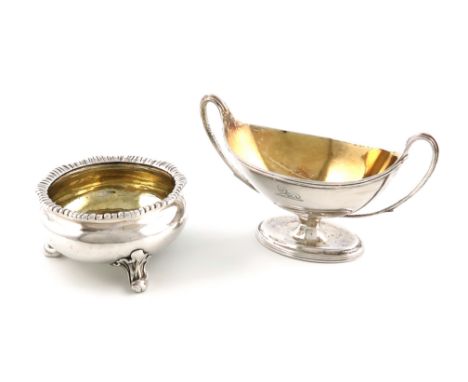 A George III silver two-handled salt cellar,by William Frisbee and Paul Storr, London 1791, oval form, reeded loop handles an