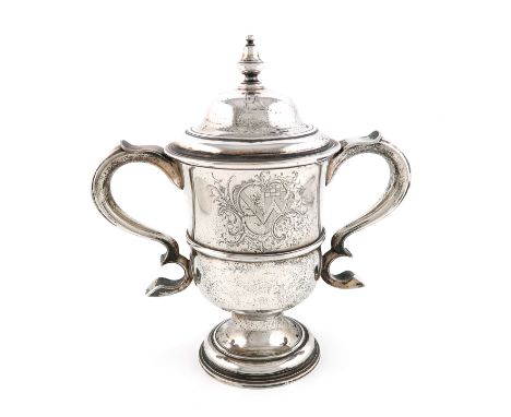 A George II provincial silver cup and cover, by John Langlands I, Newcastle 1759, circular form, central girdle, scroll arms,