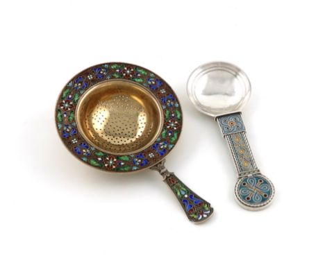 A Norwegian silver-gilt and enamel tea strainer, by David Andersen, Oslo, circa 1910, circular form, foliate polychrome pliqu