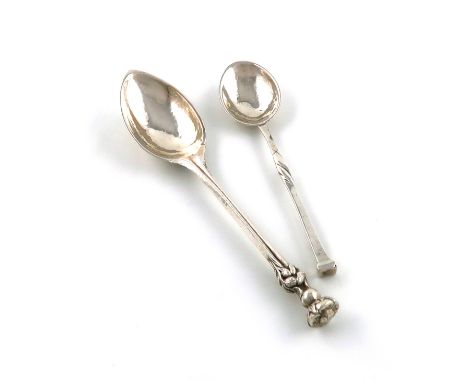 By Omar Ramsden, an Arts & Crafts silver grapefruit spoon, London 1932, spot-hammered decoration, rose stem handle, rose fini
