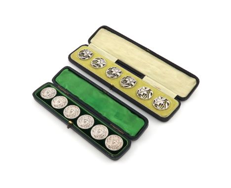 A set of six Edwardian Art Nouveau silver buttons,by Synyer and Beddows, Birmingham 1909,circular form, pierced with a daffod
