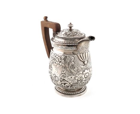 A George III silver hot water pot,by Rebecca Emes &amp; Edward Barnard I, London 1815,tapering baluster form, embossed decora
