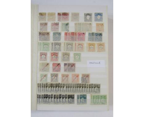 Portugal Colonial Stamps: Large 48 page stock book of mint and used issues including Angola, Azores, Cape Verde, Funchal, Cap