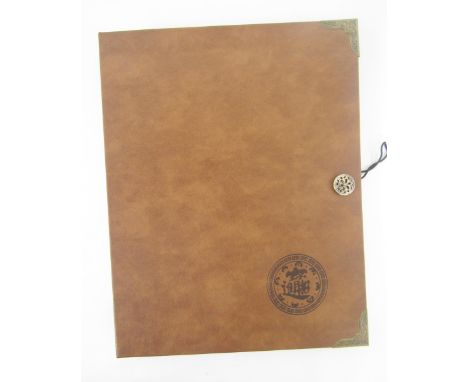 Collector's folder containing 11 sheets of various denominations, including silver crowns (poor condition) half crown, shilli