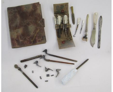 Mother-of-pearl handled set of manicure and other items to include corkscrew and button hook, small paper knife&nbsp;with met