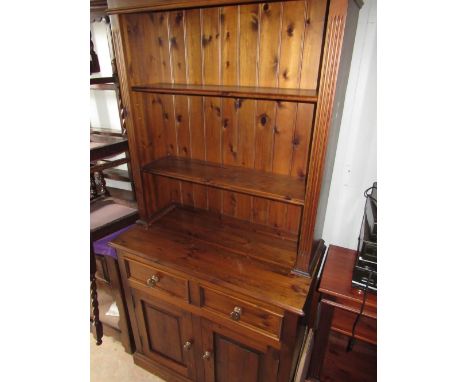 Stained and waxed pine modern dresser with twin shelf back, , the base with two drawers and two panelled doors, W100cm D44cm 