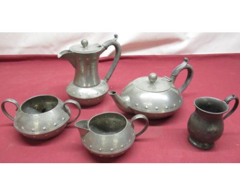 Early 20th Century Walker and Co. Arts &amp; Crafts-style four piece hammered pewter tea service, stamped with manufacturer's