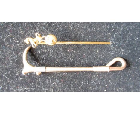 Hallmarked 9ct yellow gold riding crop brooch, approx 5cm, 3.7g and a yellow metal pin stick with horse terminal, (2) 