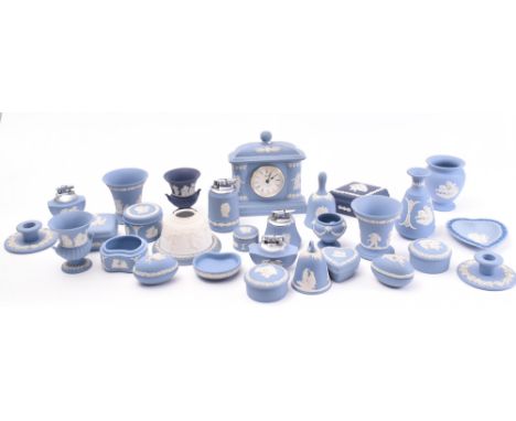 A collection of vintage 20th century Wedgwood jasperware in hues of baby blue &amp; navy. The lot to include a mantle clock, 