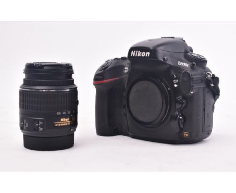 Nikon - a vintage Nikon D800E camera, with camera lens marked Nikon DX VR AF-S Nikkor 18-55mm. Sold as untested.&nbsp;